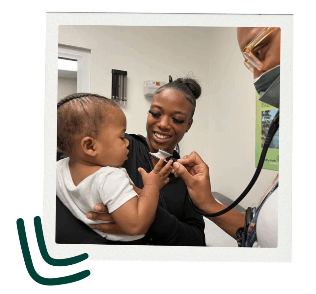 BLOOM Resident, Dr. Jasmine Solola, working with a BLOOM family.